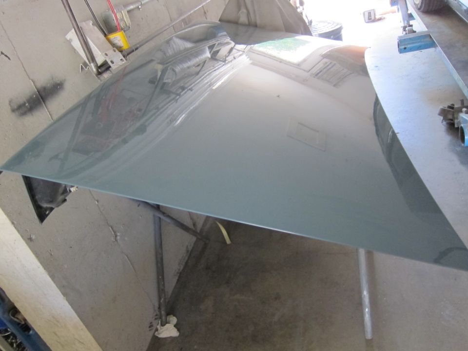 Gray hood resting on supports
