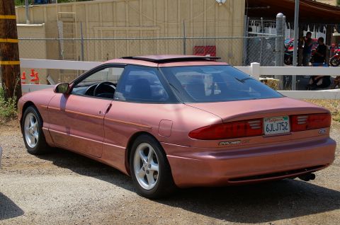 1993 Ford Taurus - This Ford Probe GT features a distinctive rose gold paint job and a sporty coupe design.