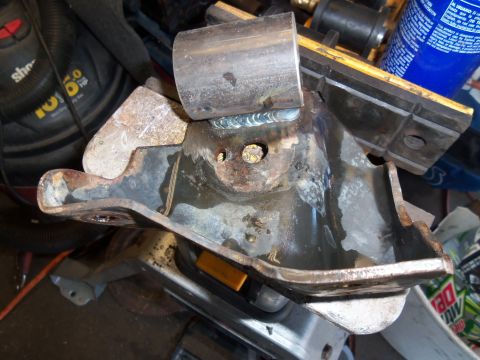 1987 Ford Ranger - A close-up view of a modified metal bracket, likely for automotive repair or fabrication.