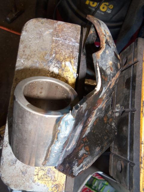1987 Ford Ranger - A metal part, likely a component from a vehicle, is shown after being welded.