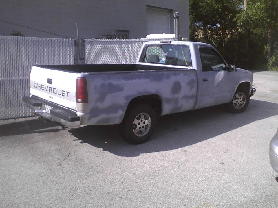 Chevrolet pickup truck, primer finish, rear 3/4 view
