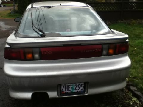 1990 Geo Storm GSi - Rear view of a silver 1990 Geo Storm GSi, showing its distinctive taillight bar and spoiler.