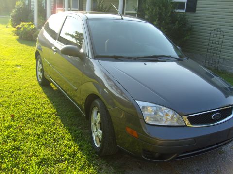 2007 Ford Mustang - This dark gray hatchback, identified by its Ford grille, is not a 2007 Mustang as the registry suggests.