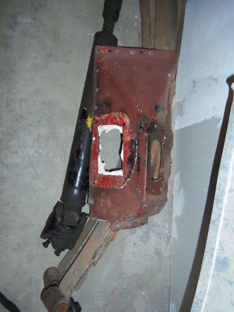 1968 Ford Bronco - A rusty metal panel and driveshaft are shown, not a complete vehicle.