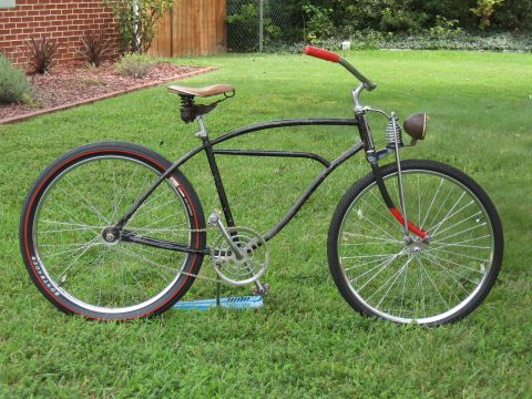 1994 Ford Bronco - A custom bicycle with a vintage aesthetic sits on a grassy lawn.
