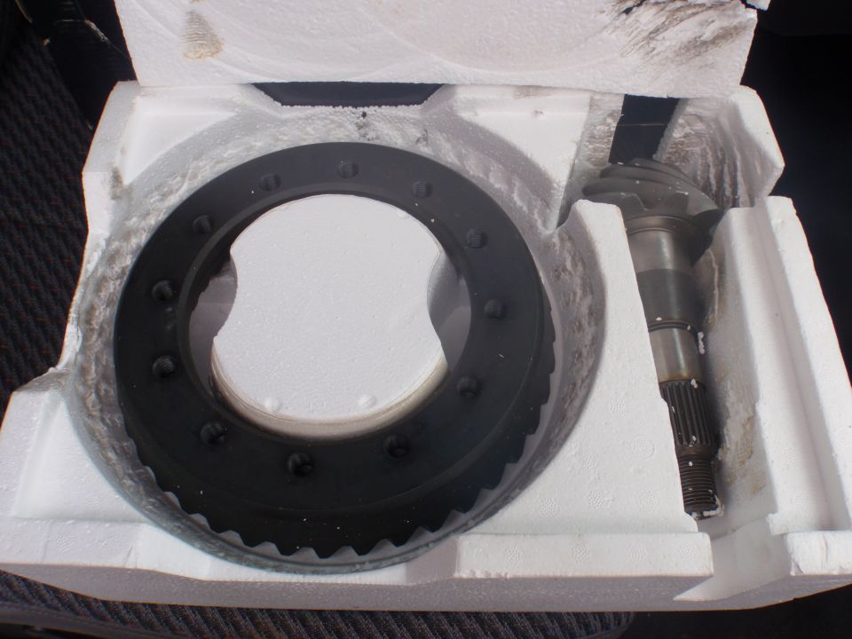 Differential ring gear and pinion gear set in white foam packaging