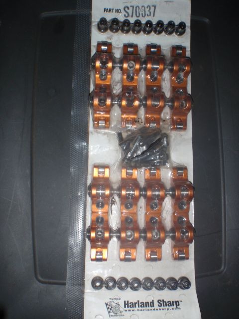 2000 Dodge 1500 - A set of orange rocker arms is displayed in its original packaging, labeled with part number S70337.