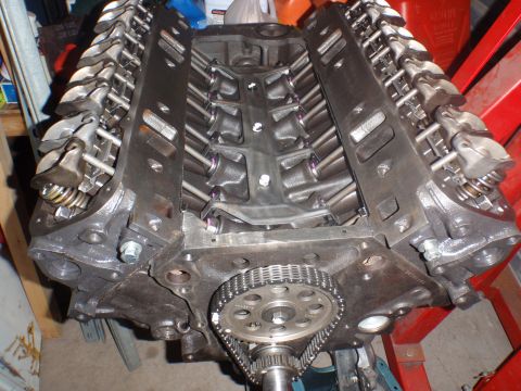 2000 Dodge 1500 - Close-up view of a V8 engine block, showing the timing chain and valve train assembly.