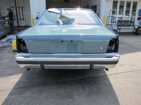 1991 Ford LTD Crown Victoria - Rear view of a 1991 Ford Crown Victoria LTD being prepped for paint, taillights removed.