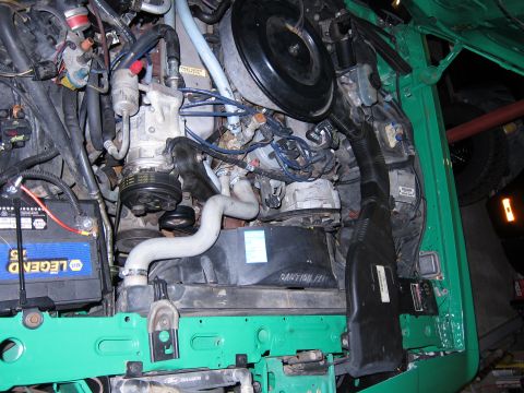 1991 Ford LTD Crown Victoria - Close-up view of a vehicle's engine bay, showing various components and wiring.