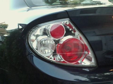 2000 Dodge Neon - The rear tail light assembly of a car is shown in detail.