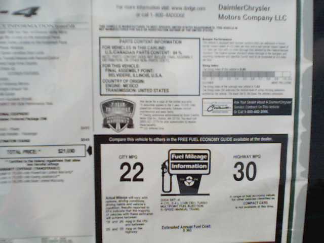 Window sticker with fuel economy information and vehicle details