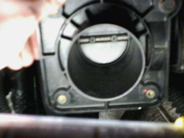 Throttle body with visible Supermotors.net logo