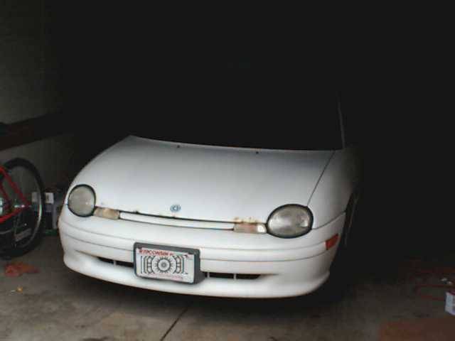 1995 Plymouth Neon front view in garage. Wisconsin license plate visible
