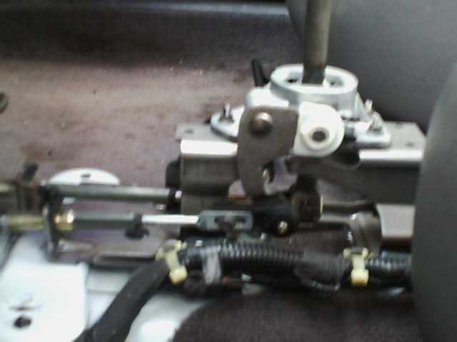 close-up of car's gear shifter mechanism