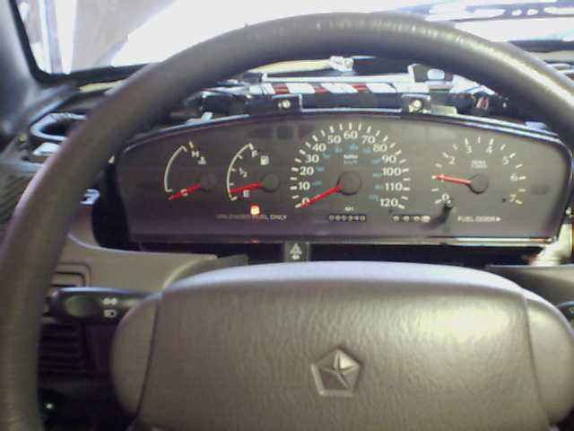 Dashboard interior with speedometer and tachometer gauges