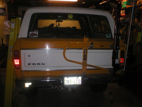1978 Ford Bronco - Rear view of a 1978 Ford Bronco, equipped with a spare tire carrier and a Hi-Lift jack.