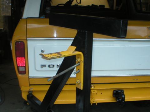 1978 Ford Bronco - Rear view of a 1978 Ford Bronco showing the tailgate and a mounted spare tire carrier.