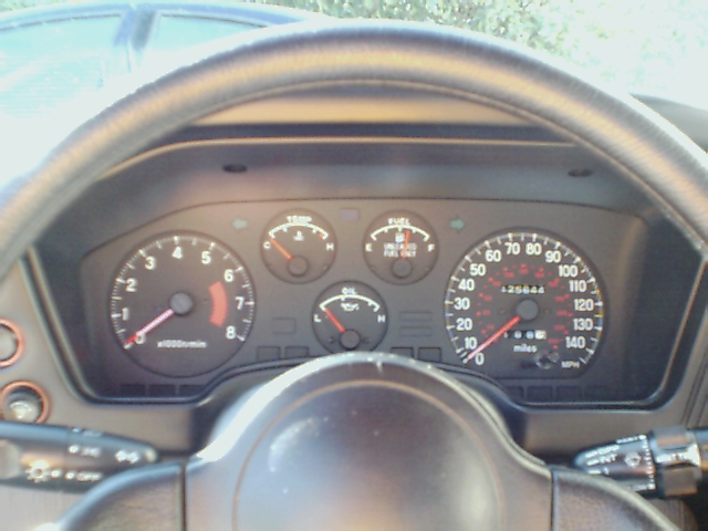 Dashboard of a 1994 Eagle Talon with speedometer and tachometer