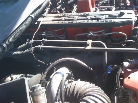 1997 Dodge 3500 - The engine features 'DODGE CUMMINS TURBO DIESEL' text on the valve cover.