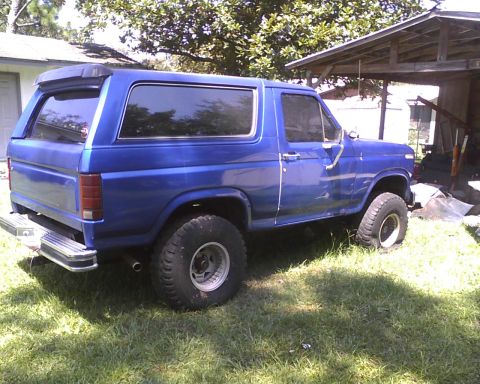 1985 Ford Bronco - This blue Ford Bronco appears to be from the early 1980s, not a 1985 model.