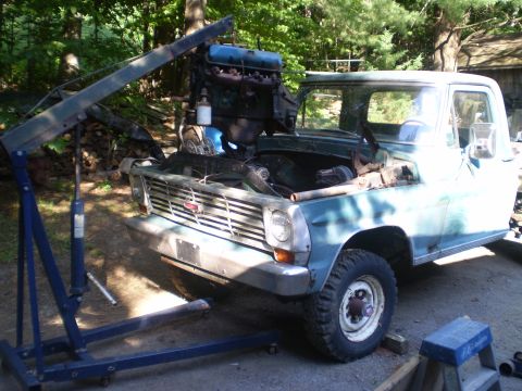 1979 Ford Bronco - Engine hoist removes the engine from a 1969 Ford F-series truck.