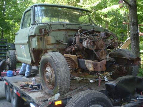 1979 Ford Bronco - This truck is missing its hood and fenders, revealing the engine and front suspension components.
