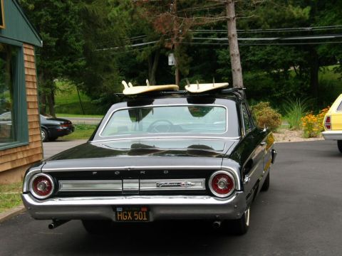 1964 Ford Galaxie - This 1964 Ford Galaxie 500XL is equipped with a roof rack carrying two surfboards.