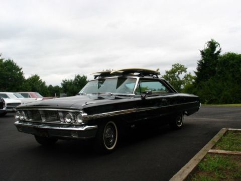 1964 Ford Galaxie - This 1964 Ford Galaxie is ready for a surf trip with boards secured on its roof rack.
