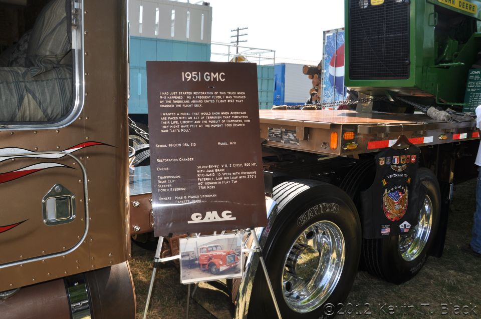1951 GMC truck with display sign detailing restoration and specs