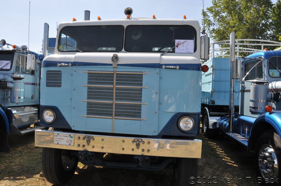 1959 Kenworth W900A truck, blue and white, front view, chrome bumper, California license plate