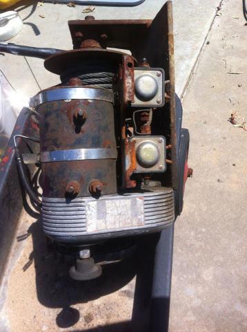 2000 Jeep TJ - This is a rusty winch with a steel cable and electrical solenoids.