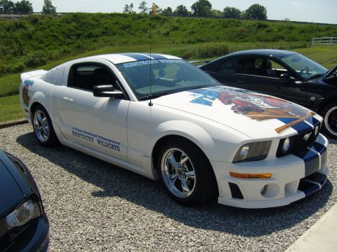 2007 Ford Mustang - White 2007 Ford Mustang with custom Kentucky Wildcats graphics and racing stripes.