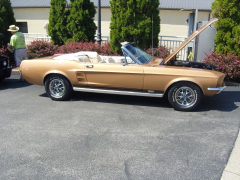 2007 Ford Mustang - A 1967 Ford Mustang convertible is displayed with its hood open.