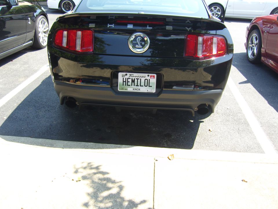 Black 2007 Ford Mustang GT rear with Shelby Cobra emblem and Tennessee plate HEMILOL