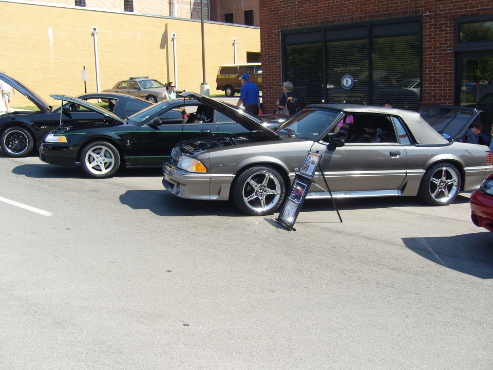 Gray 1993 Ford Mustang convertible side view with hood open