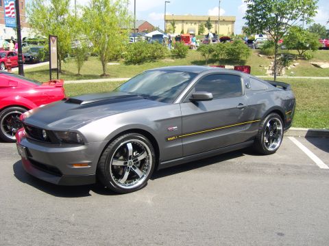 2007 Ford Mustang - Gray 2007 Ford Mustang Mach 1 at a car show.