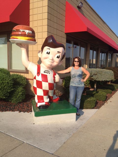 2007 Ford Mustang - A woman poses with the iconic Big Boy mascot statue outside a restaurant.