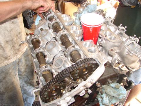 1992 Ford Taurus - Close-up view of an engine's internal components, including the timing chain and camshafts.