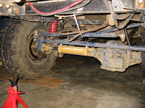 1994 Ford Bronco - Close-up of the front suspension and steering components of a Ford Bronco.