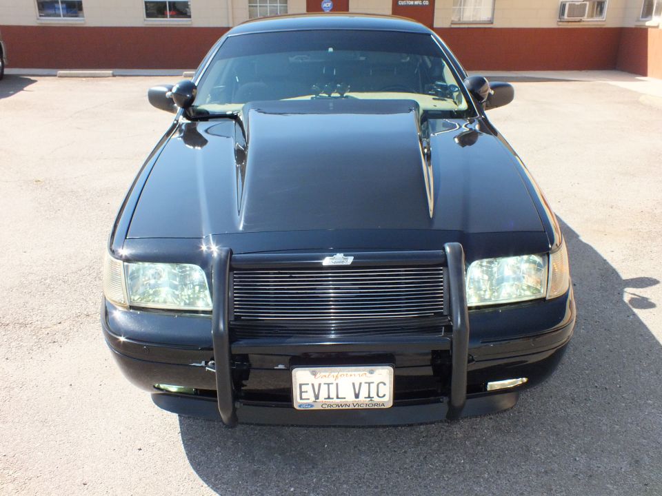 Black Ford Crown Victoria front quarter with push bar and EVIL VIC Crown Victoria plate