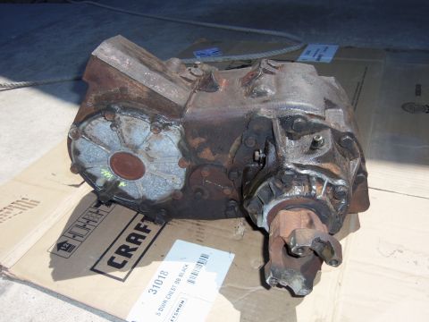 1968 Ford Bronco - A rusty transfer case is shown, with a label indicating '31018 5 DWR CHEST. SB BLACK' and a 'CRAFTSMAN' box underneath.