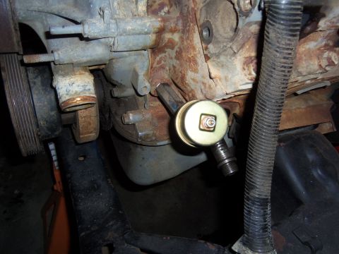 1968 Ford Bronco - Engine block detail showing a sensor installation.