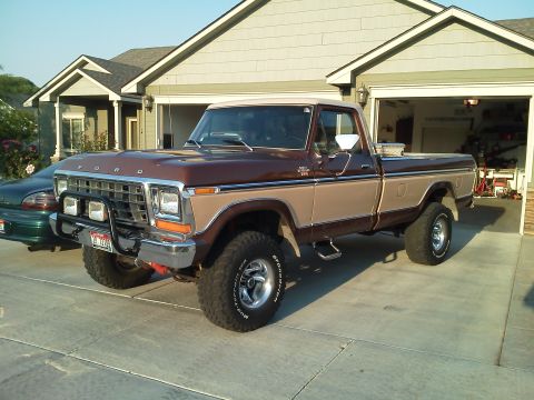 1979 Ford F-150 - This 1979 Ford F-150 pickup truck is parked in front of a house and garage.