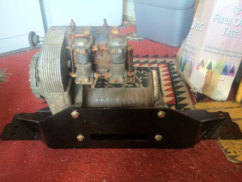 2000 Jeep Wrangler - Winch assembly with dual carburetors is shown mounted on a black bracket.