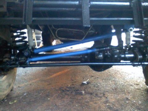 1993 Ford F-150 - Track bar in, shocks in, need to bleed brakes and get shims to cure coil bow