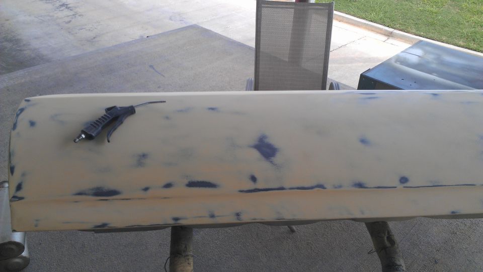 Car door with body filler and air duster tool
