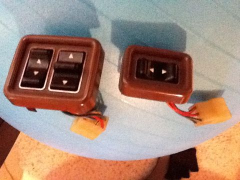 1988 Suzuki Samurai - Two power window switch assemblies are shown, one with dual controls and the other with a single control.