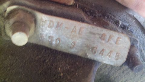 1978 Ford Bronco - Metal identification tag with stamped part numbers and codes.