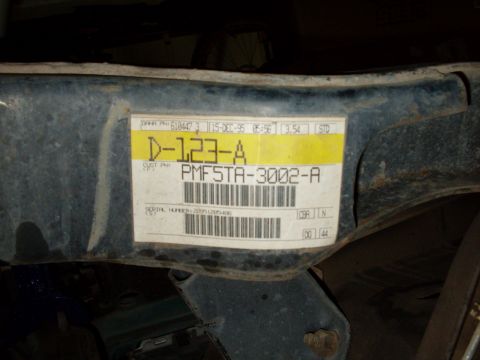 1996 Ford Bronco - A label on a metal part indicates a manufacturing date of December 15, 1995.